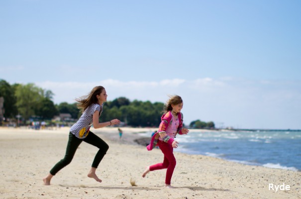 Girls playing on Ryde beach